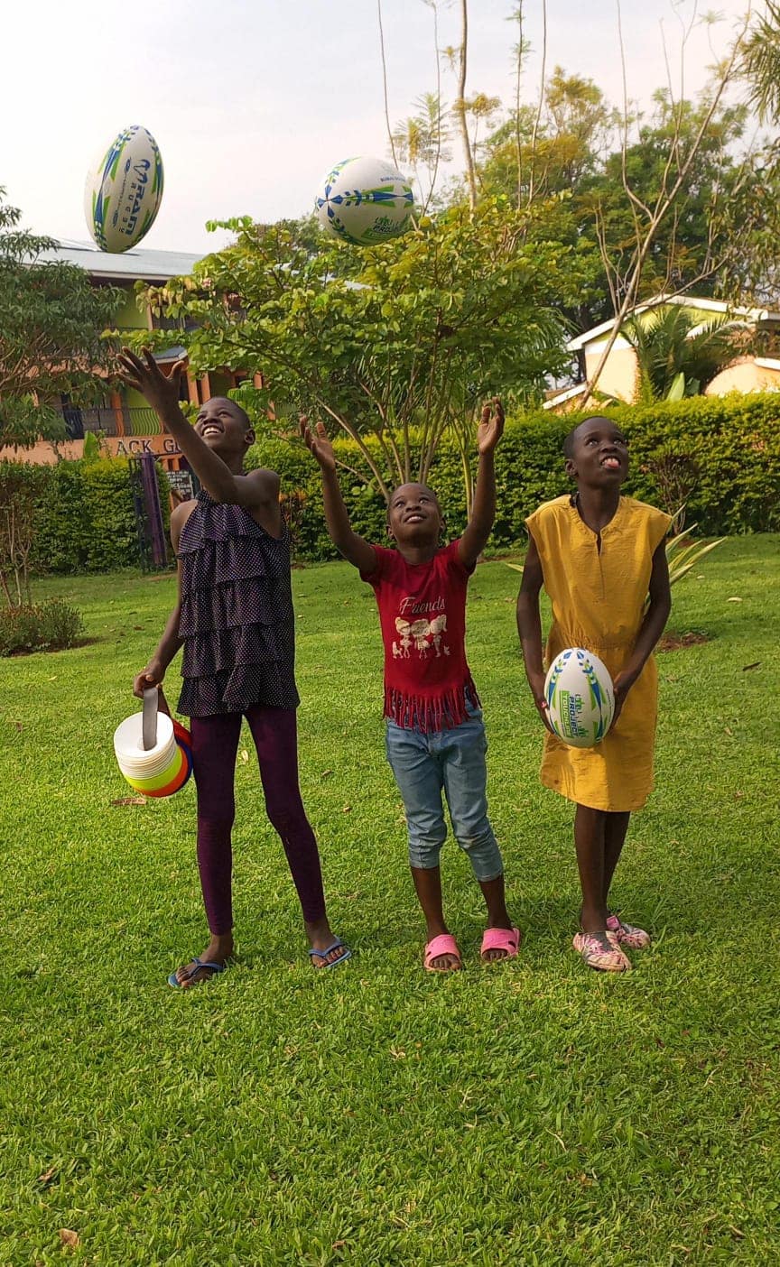 Children in Western Kenya enjoying Project Touchline rugby activities